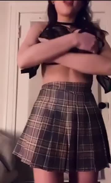 big tits schoolgirl strips and teases