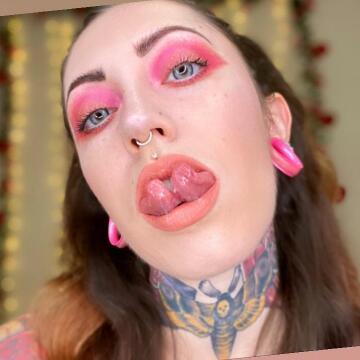 ravenraith - pink makeup brunette with tattoos and split tongue