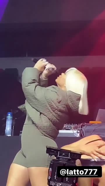 latto pretending to jerk a dick off on to her tongue live on stage