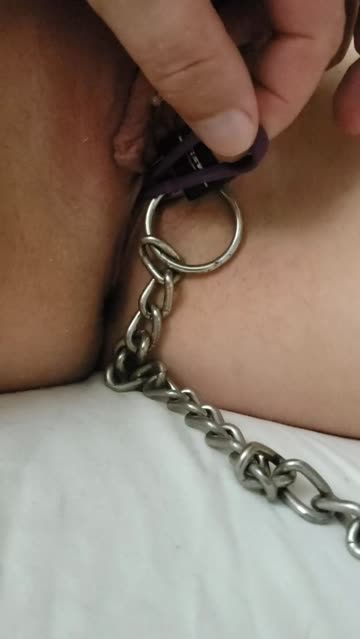 dom locks a heavy plug in my pussy, then locks my pussy shut chained to the bed ;)