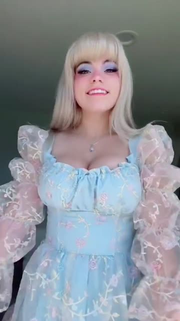 very cute woman in a blue dress