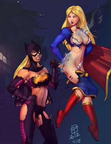 batgirl destroying supergirl’s outfit (vest)