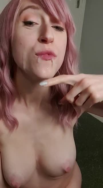 slut eating cum off her face