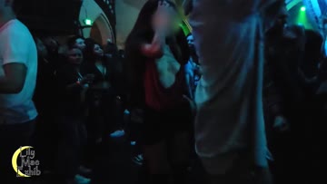 tits slipped out on the crowded dance floor!