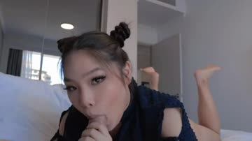 cute asian girl sucking a cock