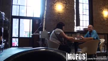 this woman rides a dick in a public cafe
