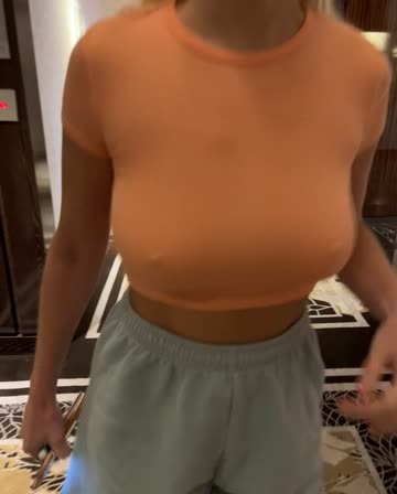 fuckdoll popping out her titties in the hotel