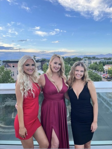 mom and daughters at a wedding