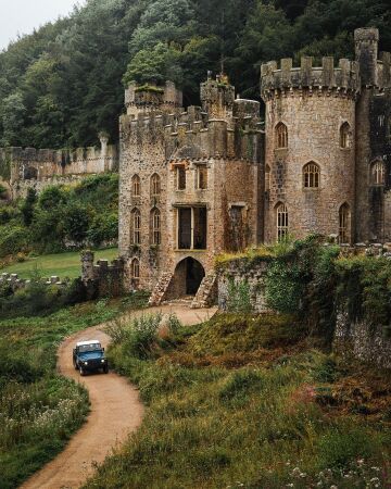 the overgrown ruins of the 19th century gwrych castle, conwy county borough, wales.