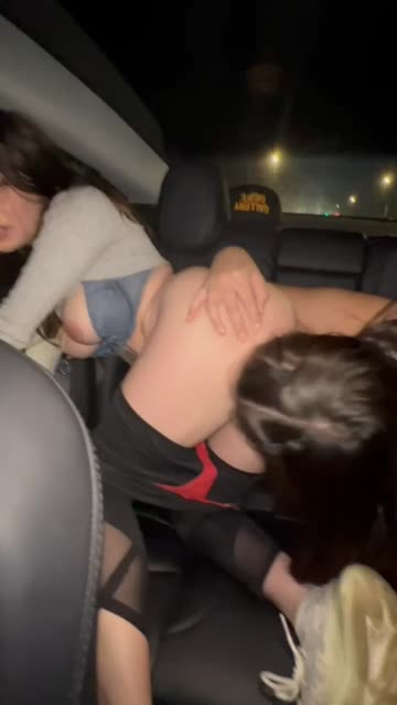 cuties playing in the back of the car