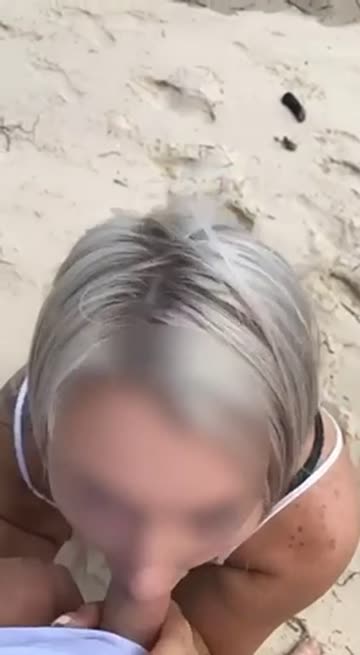 wife giving public blowjob on beach