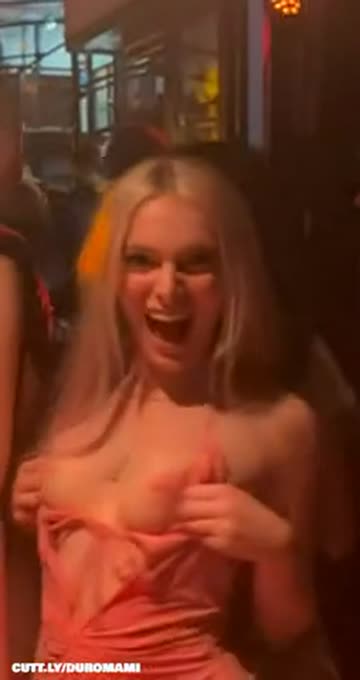 blonde flashing boobs in the nightclub