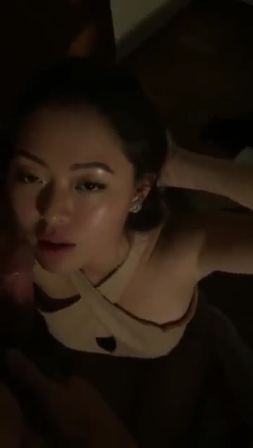 asian slut on her knees puts her mouth to good use