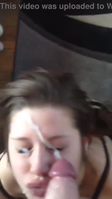 pigtailed teen gets facial from huge cock