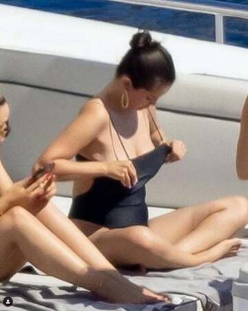 selena gomez checking out her own tits