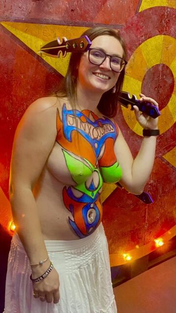 body painted, knife throwing, sexy milf