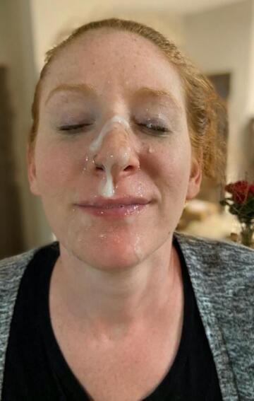 redhead caught some cum on her face