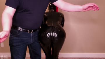 my shiny black latex ass getting a good spanking!