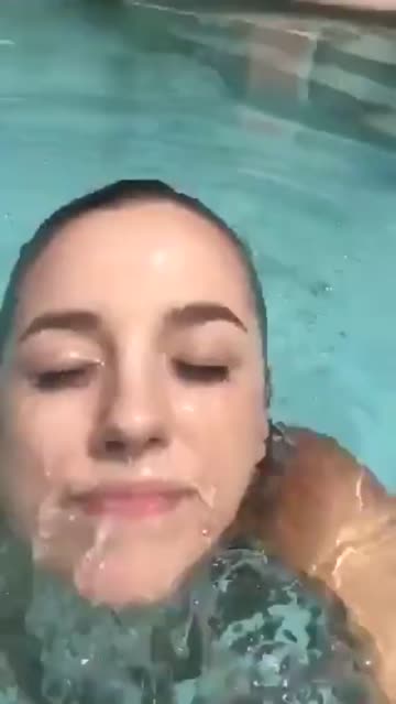 blonde huge boobs in pool