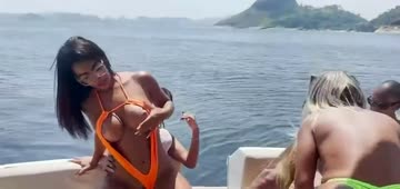 orgy in one speedboat with two hot trans, two girls, and one bbc.