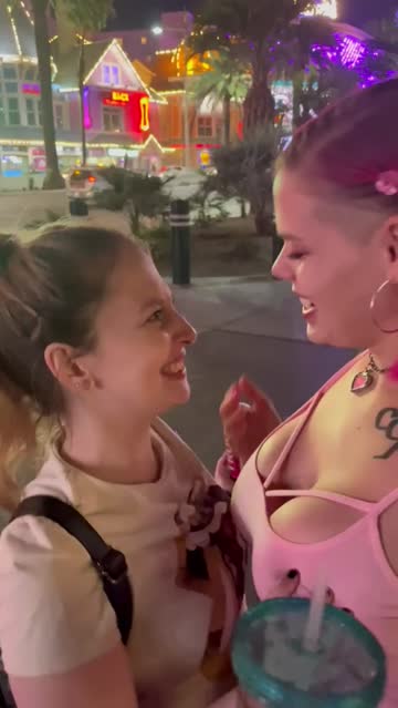 my pink hair g[f] kissing random girl on the street in vegas and getting her tits grabbed.