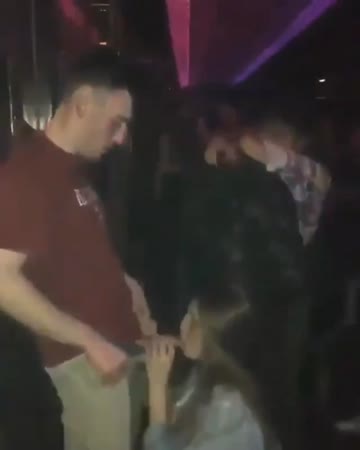 getting on her knees in the club