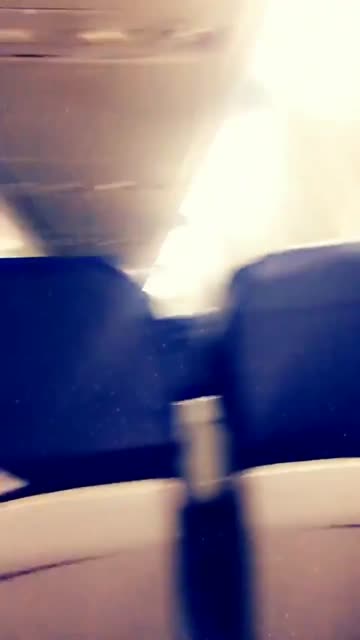 tits out on the plane