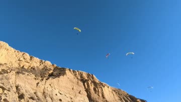 giving the paragliders something to look at