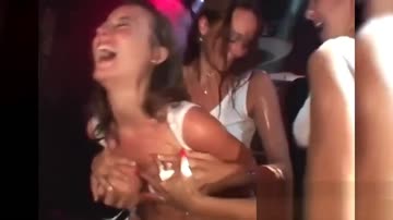 groping the busty hottie on stage.