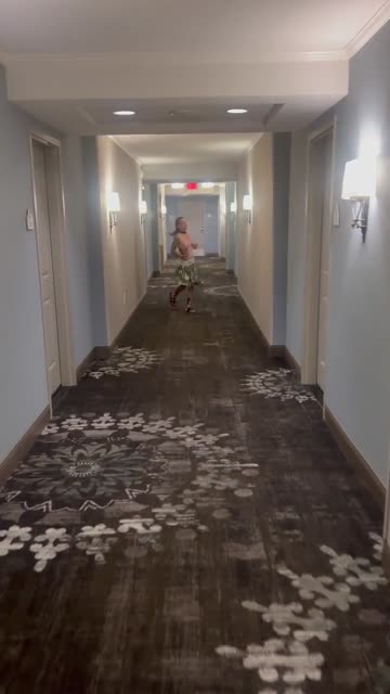 running naked down the hotel hallway. [f]