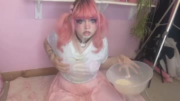 pink haired girl pukes in her bowl