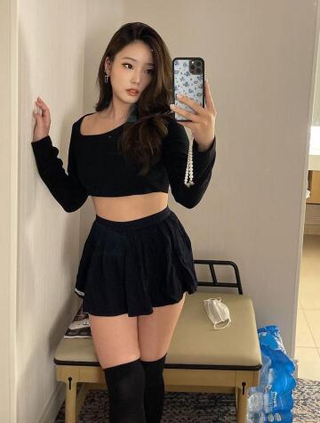 mini skirt and thigh highs