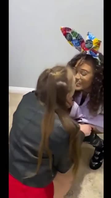 birthday girl gets a kiss as a gift