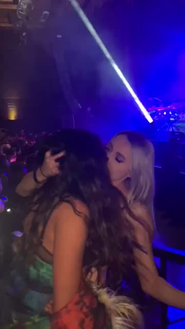 girls kissing and licking in the club