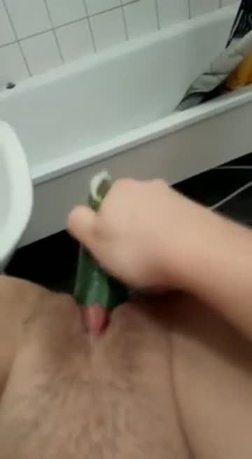 pov in bathroom with zucchini