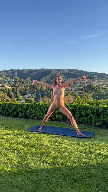 outdoor naked yoga flow for all the neighbors to see