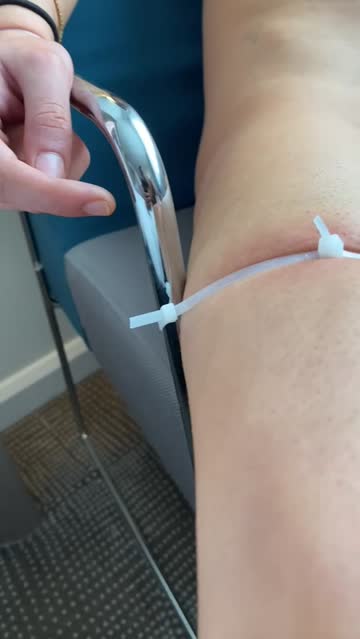 ziptied to a chair & forced