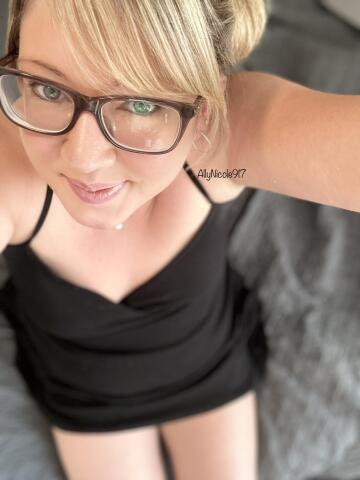 just showing off my cute black dress with my glasses