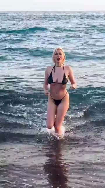 very beautiful and happy woman in bikini at the beach