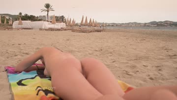 lana fully exposed on the public beach