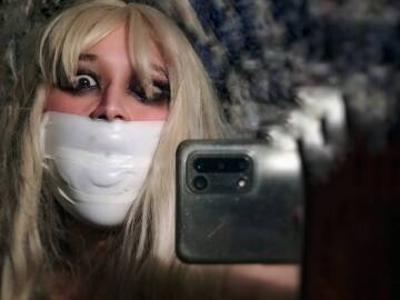 tape gagged mirror selfie