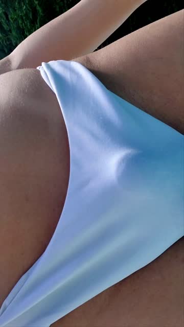 bulge in a white bikini