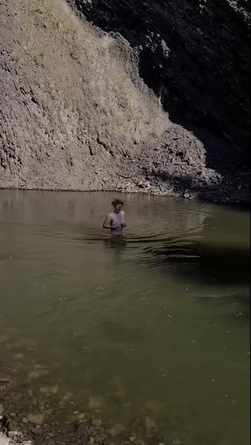 dared to skinny dip in the glacier river! it's clear that it's incredibly cold [f]