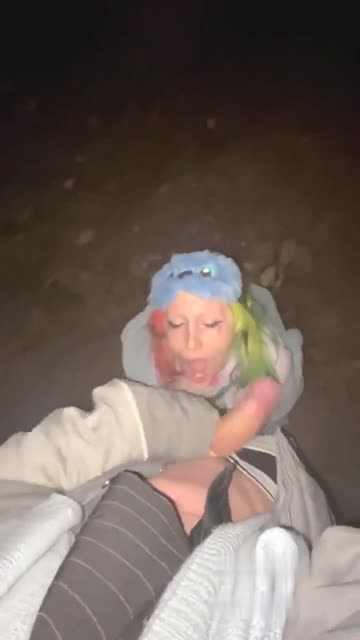 blowing huge cock in a park