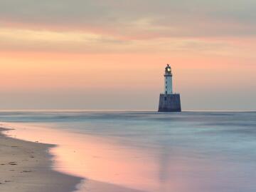 (oc) a scottish lighthouse at sunset.