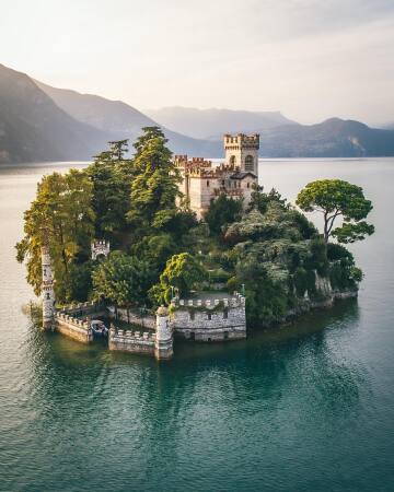 castle on isola di loreto, a small island in the middle of lago d'iseo, lombardy, northern italy.