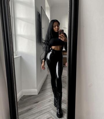 latex leggings with boots and a normal crop as an everyday outfit