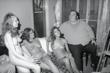 'big' davey rosenberg sits with three unidentified dancers backstage at the condor club, san francisco, august 1972