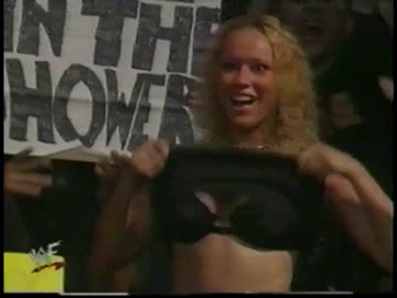 triple h gets busty wwe fan to flash her boobs to the crowd (wwf raw is war on july, 20 1998)