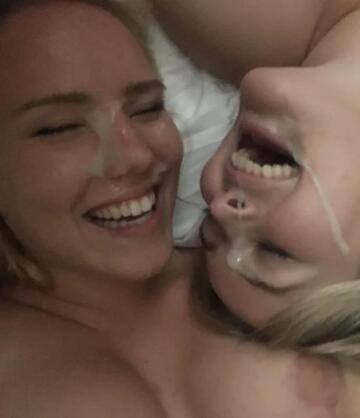 two sluts laughing after sharing the cum